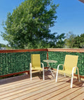 Faux Ivy Privacy Fence Screen 138 By 39 Inches with Realistic Artificial Ivy Leaves installed on a balcony railing