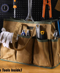 Waxed Canvas Tool Tote Bag With Large Capacity And 10 External Pockets for organizing various hand tools, displayed on a table.