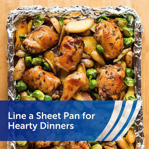 Baked chicken and vegetables on Heavy Duty Aluminum Foil Roll Beefy Strength 12 Inch Wide 50 Square Feet