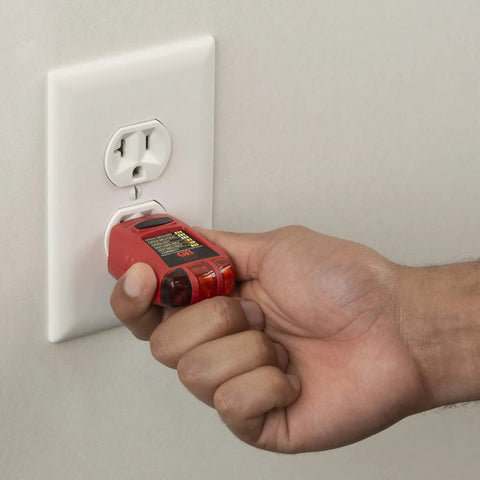 Household Electrical Tester Kit For Do It Yourself Homeowners With Voltage Tester in use checking wall outlet