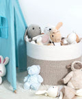Extra Large 22x16 Inch Cotton Rope Storage Basket With Grab Handles A Rugged Yet Chic Woven Bin filled with stuffed animals