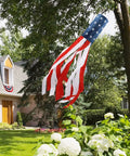 All American 60 Inch Windsock For Outdoor Decor, Heavy Duty 210D Nylon Windsock With Embroidered Stars hanging in a garden