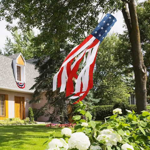 All American 60 Inch Windsock For Outdoor Decor, Heavy Duty 210D Nylon Windsock With Embroidered Stars hanging in a garden
