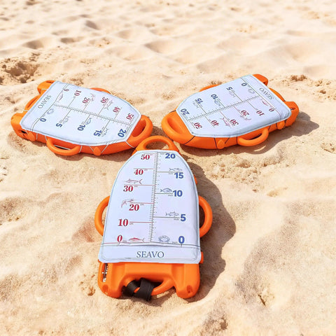 Spearfishing Float Buoy With Foldable Carbon Fiber Flagpole And D Ring Handles Built In Fish Measuring Ideal For Freediving Snorkeling Rescue And Underwater Sports Orange Red, three buoys on sand
