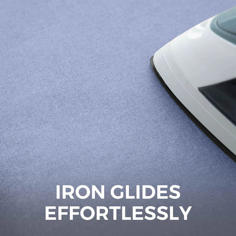 Heavy Duty Ironing Board Cover With Extra Thick Padding And Heat Reflective Silicone Coating Built Tough To Cut Your Chores Down And Keep Clothes Pristine Size 15 By 54 Inches Blue with iron gliding smoothly over surface.