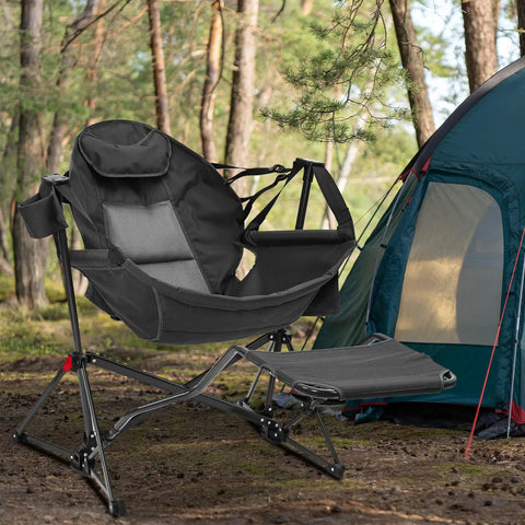 Hammock Camping Chair With Detachable Footrest And Cup Holder beside a tent in a forest setting, highlighting portability and comfort.