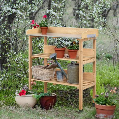 Potting Bench With Natural Wood Top And 3 Tier Shelves Outdoor Garden Workstation With Hooks Fir Wood Potting Table shown in garden