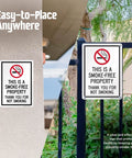Straight Up Smoke Free Property Sign Featuring Bold No Smoking Symbol, 14 X 10 Inch Heavy Duty Rustproof Aluminum Metal Wall Yard Sign, Super Durable Indoor Outdoor Setup, Made Right In Usa displayed on a wall and fence.