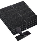 Heavy Duty 1x3 Inch Hook And Loop Strips Set With Nylon Self Adhesive Tape Dots, Double Sided Backing, Strong Hold For Office, Home, Car And Craft Projects, No Drill No Mess Black, close-up of black strips displayed on a stack.