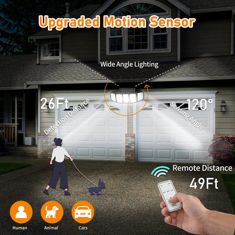 Outdoor Solar Flood Light With Motion Sensor, 5 Heads, 300 LED, IP65 Waterproof illuminating a driveway with a remote control.