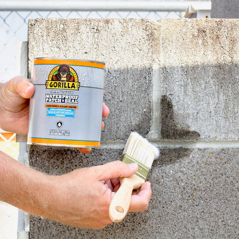 Crystal Clear Liquid Rubber Waterproof Sealant 32 Ounce Patch And Seal Coating That Stops Leaks And Seals Out Water Air And Moisture With DIY Friendly Flexible Rubberized Protection applied on concrete wall with brush