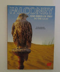 Cover of the book 'Birds Of Prey In The Gulf A Real World Guide To Falconry Culture In The UAE Full Of History And Hawking Tips And Wildlife Watching For Curious Readers Today For Newcomers Everywhere' featuring a falcon on a perch in the desert.