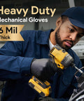 Black nitrile disposable gloves, 6 mil, large, worn by a mechanic using a yellow drill (side view).