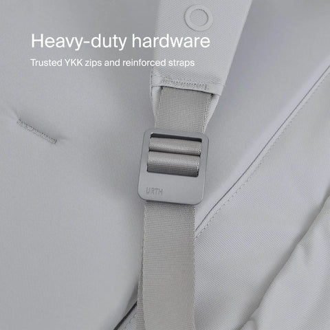 Close-up of Norite 24L Modular Camera Backpack in ash grey, showing heavy-duty YKK zips and reinforced straps.