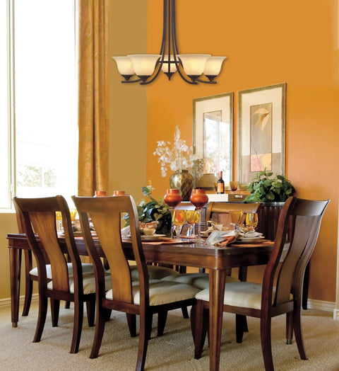 Five Light Dope Oil Rubbed Bronze Chandelier With Burnt Scavo Glass For Interior Rooms hanging above dining table.