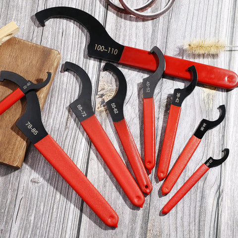 Nine Piece Adjustable Coilover Wrench Set For Suspension And Shock Adjustments With Six Sizes And Easy Grip Rubber Handles
