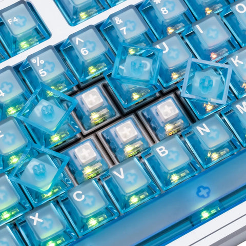 Built Damn Tough Full Aluminum Wireless Mechanical Keyboard With Hot Swappable Switches and Smart Tri Mode Pairing Featuring Custom RGB Lighting 8000Mah Cell For Elite Gaming And Typing Setups showing custom blue keycaps and RGB lighting.