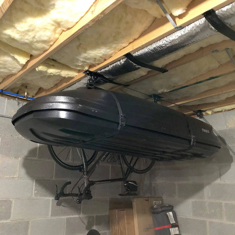 Overhead Garage Ceiling Hoist Ultra Heavy Duty Storage Holds 150 Lbs Pulley Lift System with kayak and bike suspended