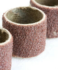Close-up of sanding drums from Variable Speed Rotary Tool Kit With 100-Piece Accessories For Cutting Sanding Polishing Grinding And More