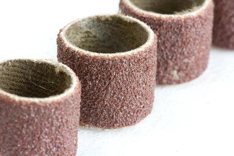 Close-up of sanding drums from Variable Speed Rotary Tool Kit With 100-Piece Accessories For Cutting Sanding Polishing Grinding And More