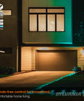 Modern house exterior with ZigBee RGBW Color Changing Outdoor Accent Light Starter Kit 14 Foot Run illuminating driveway, wet rated.