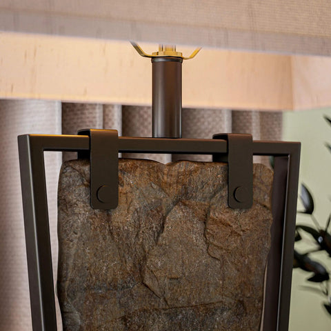 Close-up of natural slate finish rustic table lamp with oil rubbed bronze accents, featuring a slim suspended slate panel.