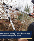 Person using Double Ratcheting Bypass Loppers For Beefy Tree Trimming, Extendable 26 To 40 Inch Handles on thick branches.