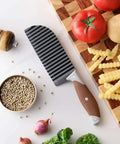 Crinkle cutter knife with ribbed stainless blade and brown rubberized handle, front view