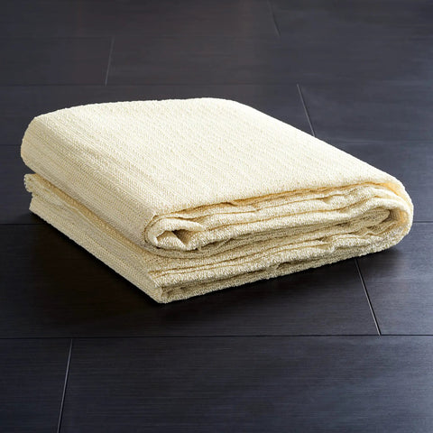 Folded beige Non Slip Rug Pad Grippy Anti Skid Grip For Under Rugs And Carpets Stay In Place On All Hard Floors 6 Foot Square Open Weave