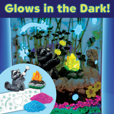 Grow N Glow Terrarium Kit For Kids with glowing raccoon and campfire decor under glowing stars, STEM project for children's learning.
