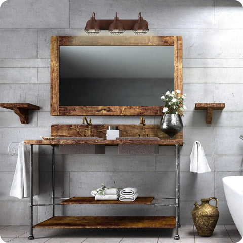 Three Light Modern Industrial Farmhouse Vanity Light in Brushed Bronze Finish above rustic bathroom mirror with bronze frame