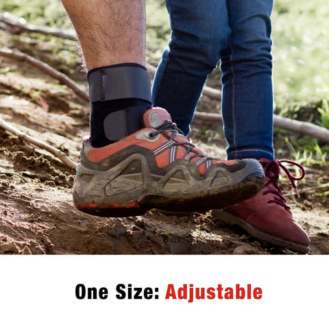 Person wearing Deluxe Ankle Stabilizer With Adjustable Support In Black 1 Pack on trail, customizable compression visible