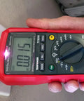 Person using Auto Range Digital Multimeter With NCV, Backlit LCD, Beast-Mode Readouts, Pro-Grade Features for AC voltage check