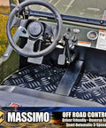 Interior view of green Mini 125cc Go Kart with 3 Speed Semi Automatic Transmission, showcasing the steering wheel and pedals.