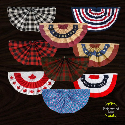 Various patriotic embroidered bunting banners, including USA pleated banner with brass grommets and double-stitched panels.