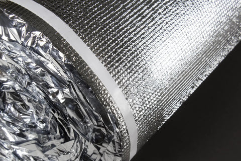 Close-up of rolled 3 In 1 Vapor Barrier Flooring Underlayment Bundled With PreAttached Overlap Tape 2mm foam pad.