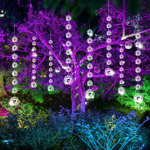 Illuminated 8 Pack Mini Disco Ball Garlands Silver Mirror Balls Hanging Banner in a vibrant outdoor party setting