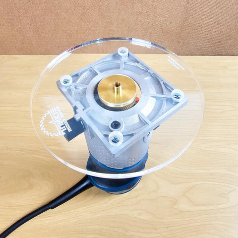 Heavy Duty 6 Inch Round Router Base Plate With Snappy Pre Drilled Holes Clear Acrylic Drop In Ready Fit For Bosch Colt Routers And Template Guides Made In USA Killer Woodworking Tool on a work surface.
