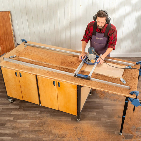 Man using benchtop board slab flattening jig for your router sled system to smooth wood slab on workbench.