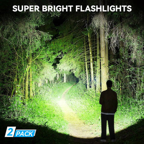 Person using Rechargeable LED Flashlight Beast Bright 100,000 Lumens Tactical Torch illuminating a forest path at night, dual pack shown.