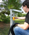Person using Power Grip 30-Foot 50-Amp Camper RV Extension Cord With Copper 6/3 And 8/1 Gauge Wires outdoors at power station