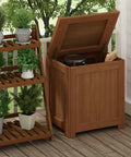 Outdoor Hardwood Storage Box With Slatted Vent Design For Drainage Raised Base Keeps Contents Dry Weather Resistant Porch Chest