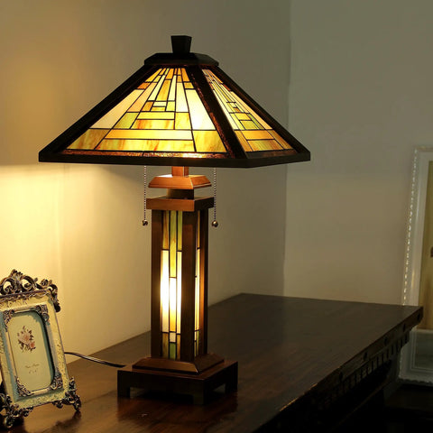 Gawain Double Lit Table Lamp With Multicolor Glass, Tiffany Style Mission Design on desk, glowing amber light, pull chains visible