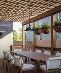 Broadcast 3 Light Outdoor Chandelier in oil rubbed bronze with copper highlight, hanging on patio pergola over dining table, 18x21 inches