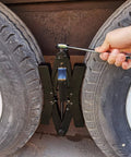 Two Pack Tandem Wheel Chock Stabilizers With Scissor Locking Design Expand From Three Point Five Inches To Twelve Inches To Prevent Wheel Shifts For Campers Trucks Travel Trailers Fifth Wheels And RVs securing tandem wheels tightly.