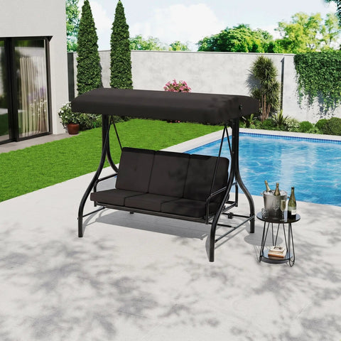 Three-Seat Outdoor Porch Swing With Adjustable Canopy For Sun Protection, Sturdy 800 Lb Heavy Duty Steel Frame, Reclines To A 180 Degree Swing Bed, Cup Holder Trays, Cushions And Pillows For Garden, Black, by a poolside.