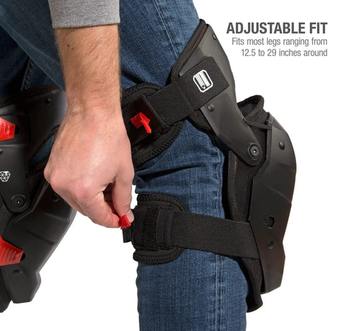 Weight Dispersion Foam Pro Grade Knee Pads With Thigh Stabilization For Floor And Roof Projects Built Tough Poly Shell And 1680D Lining Adjustable Fit For All Day Comfort One Pair being adjusted on a model's leg