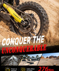 Heavy Duty Electric Dirt Bike With 5500W Mid Drive Motor And 276Nm Torque, showing the rear tire and chain in sand.