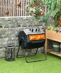 43 Gallon Dual Chamber Tumbling Compost Bin With Sliding Doors in garden setting.