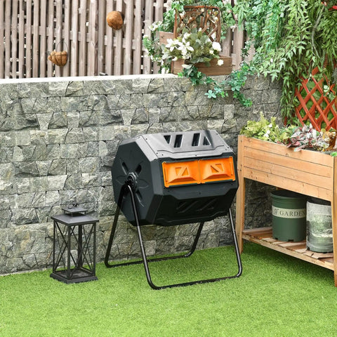 43 Gallon Dual Chamber Tumbling Compost Bin With Sliding Doors in garden setting.